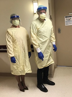 CEO Theresa Larivee and Dr. Braffman dressed in PPE